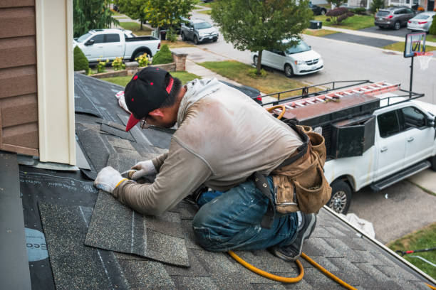 Professional Roofing technician working in Rumford, RI